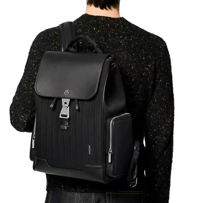rimowa never still leather flap backpack